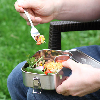 stainless steel lunch box outdoors eating