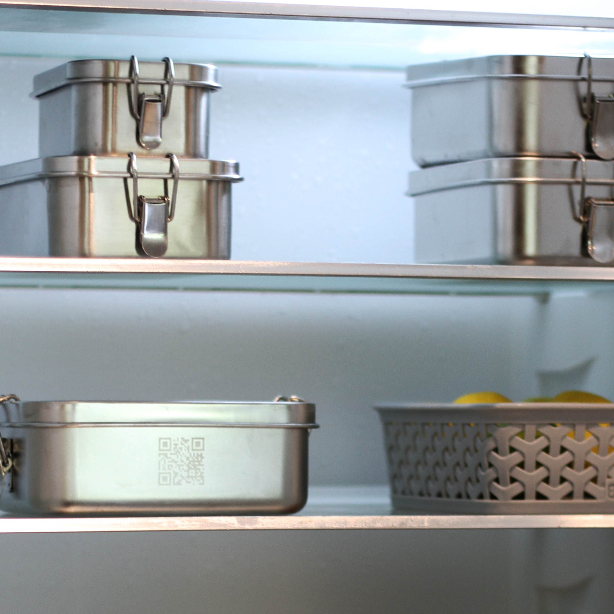 Stainless steel food containers from LftOvrs stacked with kids meals